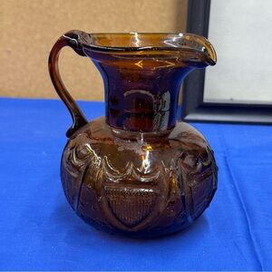 Vintage Clevenger Brothers Amber Glass Pitcher with Stars & Shields